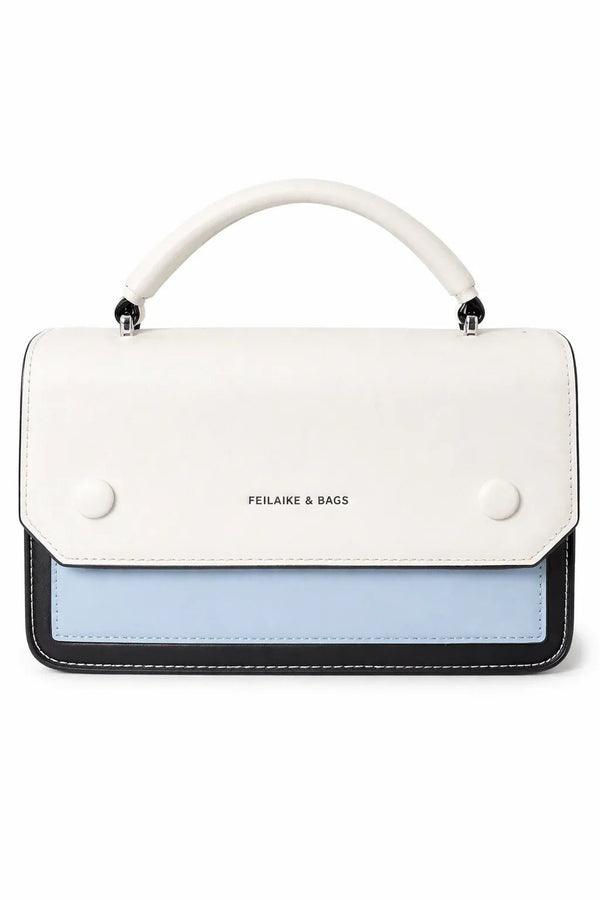 White and light blue color-block handbag with top handle and FEILAIKE & BAGS branding